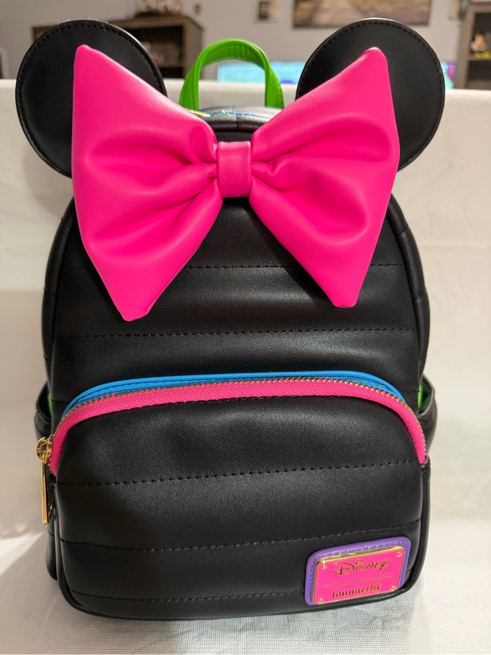 Disney Neon and Black Backpack with Hot Pink Bow